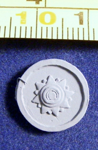 ACR46 round shield with sun motif